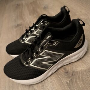 New Balance Woman's Black and White Sneakers 460